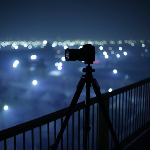 4c2fb-digital-camera-on-tripod-beside-hand-rail-3716556